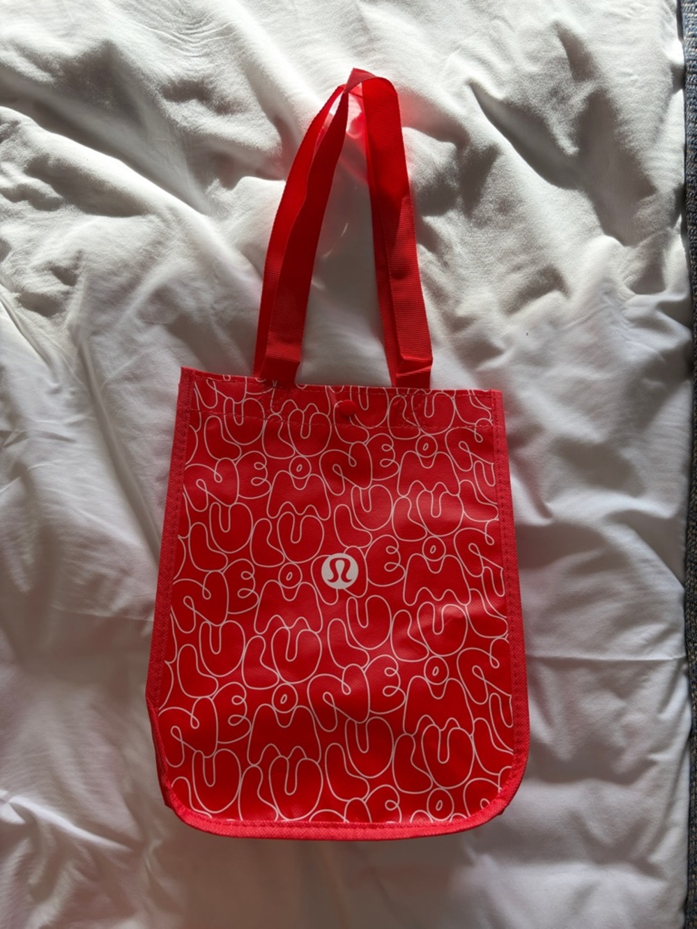Lululemon Athletica small Red Tote with White Script Logo Pattern, NWOT